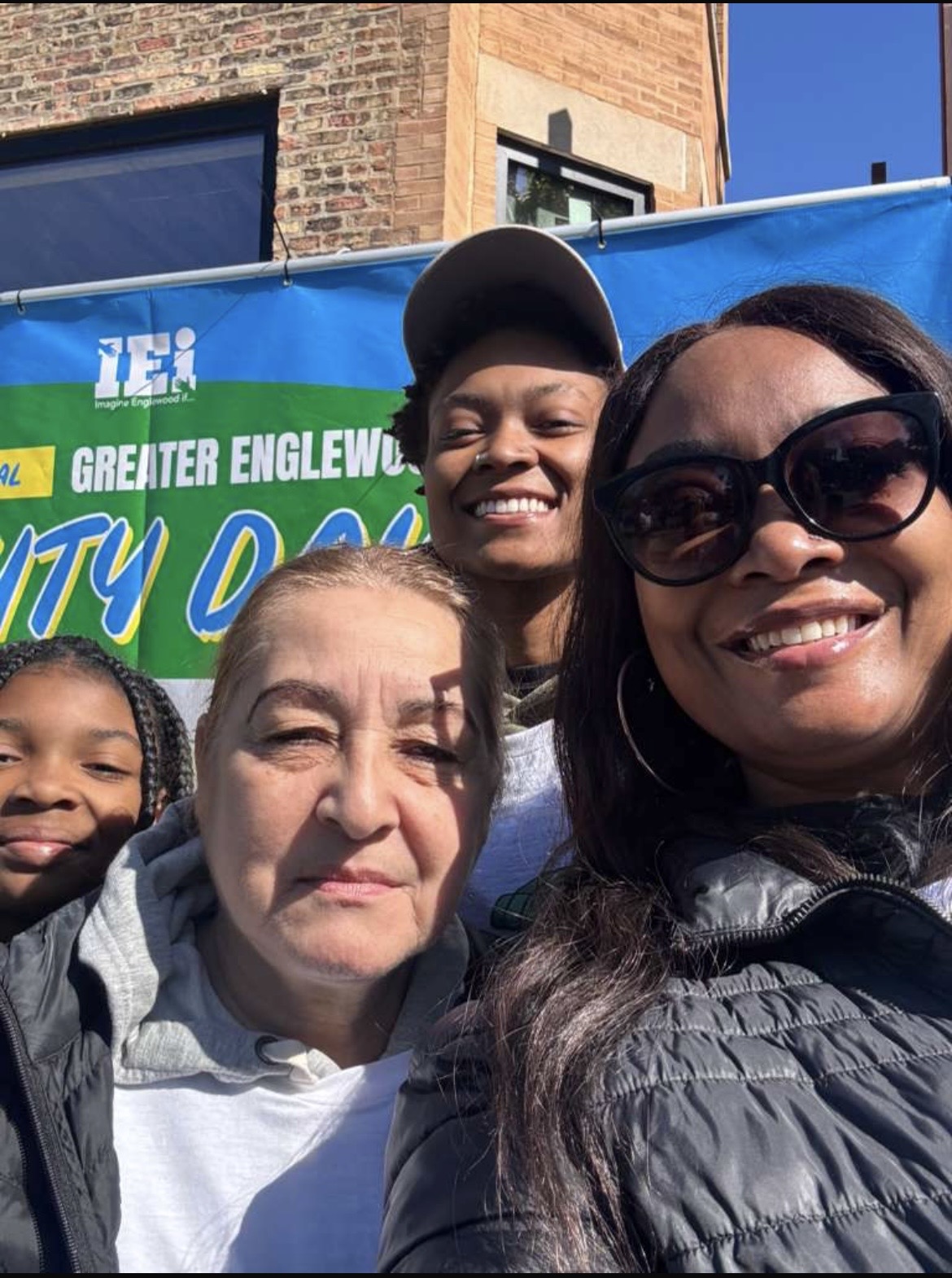 Volunteers smiling for a selfie at Unity Day