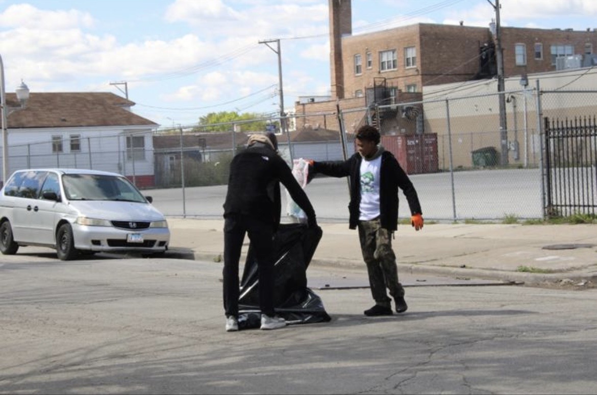 Volunteers picking up trash on a Chicago street